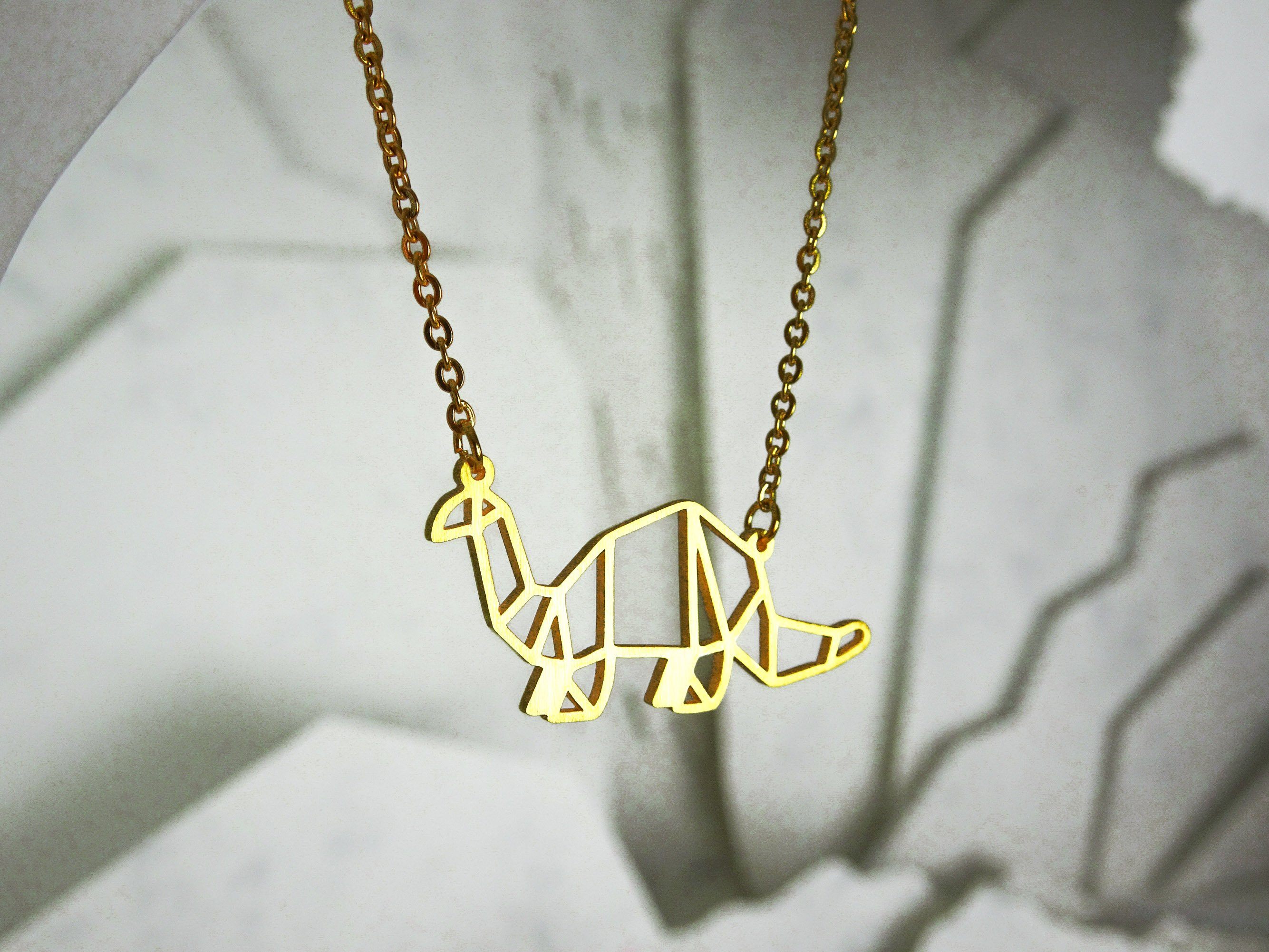 Dinosaur Gold Origami Geometric Necklace